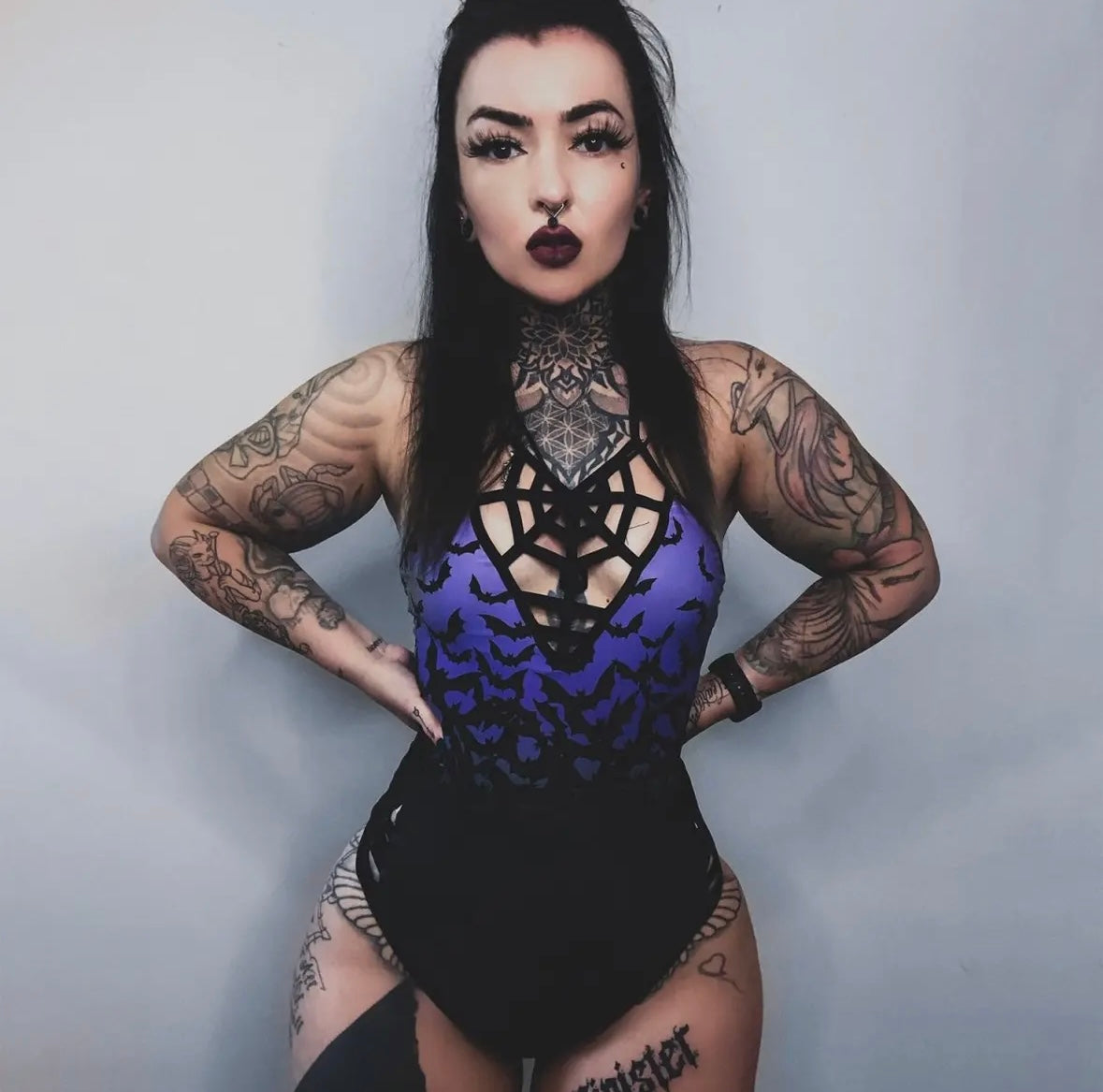 Bats in purple sky one piece swim