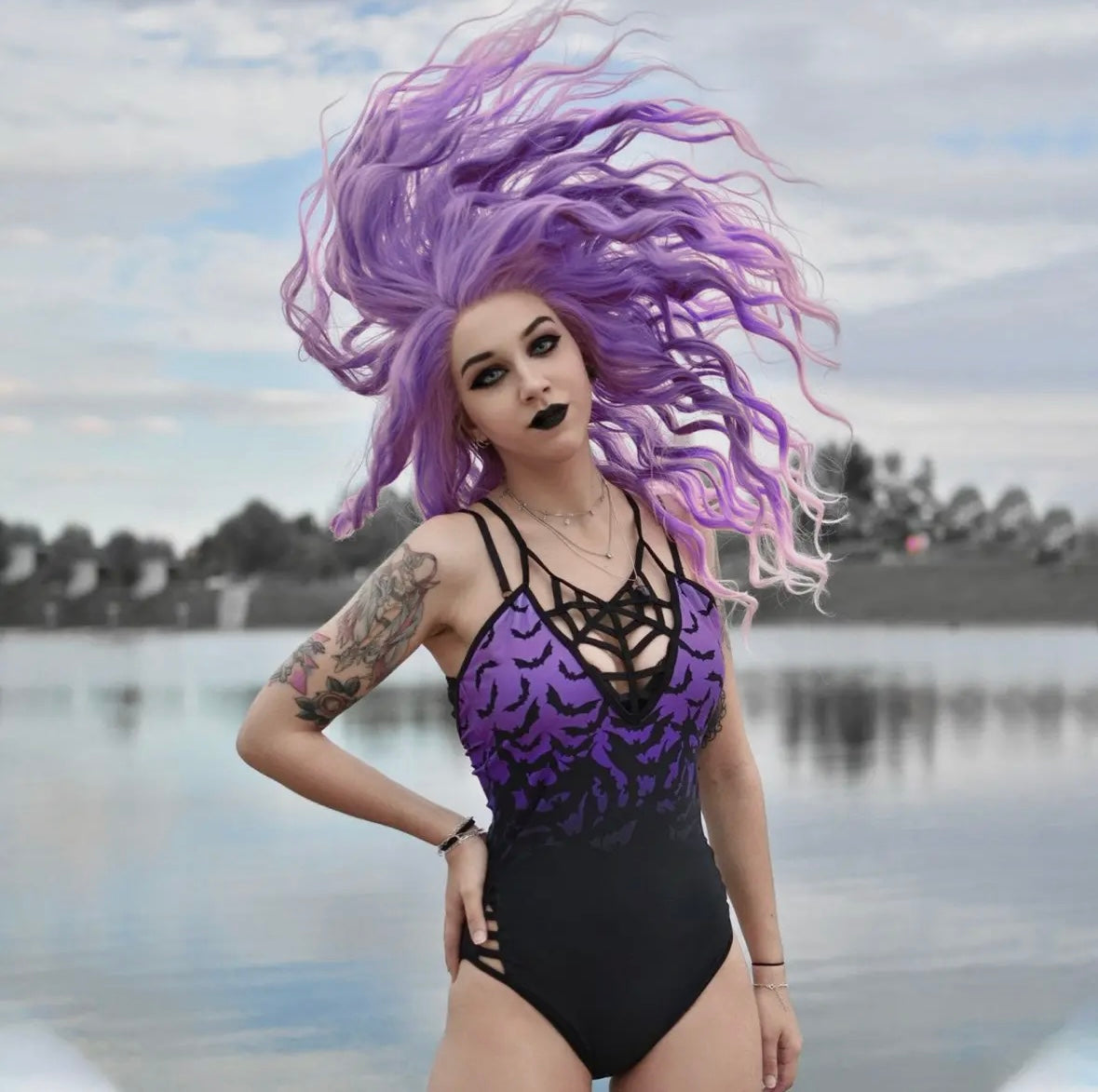 Bats in purple sky one piece swim