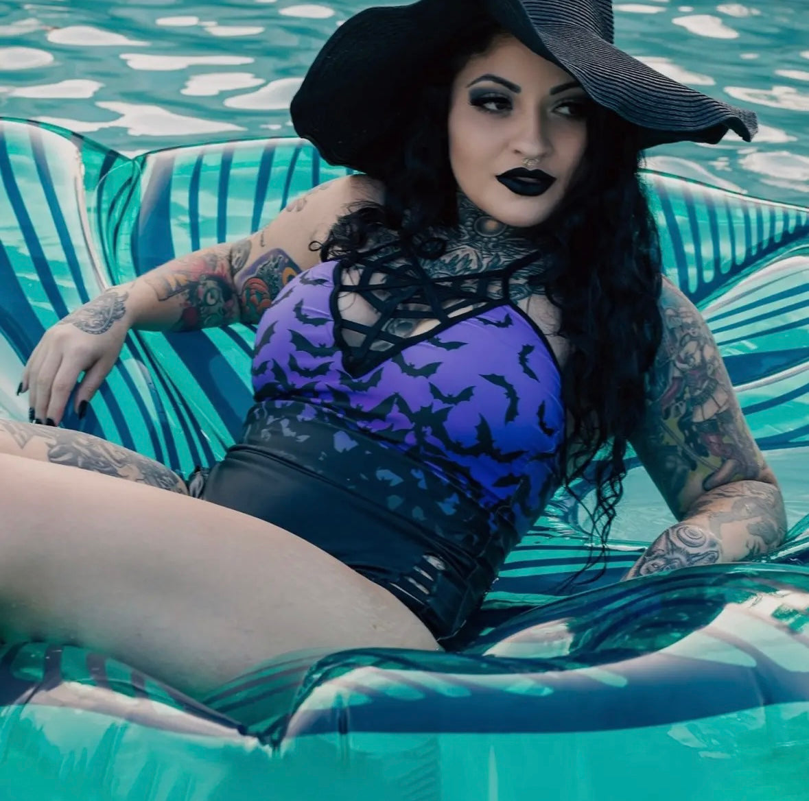 Bats in purple sky one piece swim